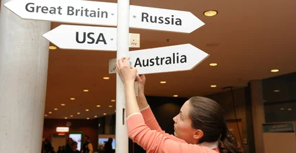 White signs with country names