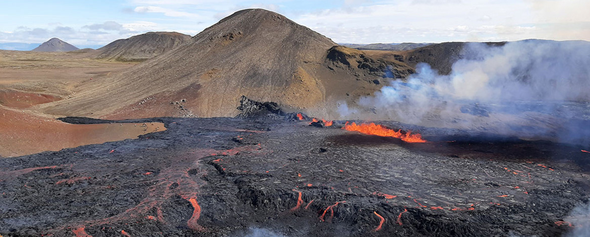 Lava flow field during the Meradalir eruption in 2022. The photo was taken within 24 h of the eruption onset and the elongated fissure that effuses lava is still visible. - 