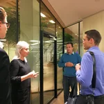 The Chief Press Officer Jacob Hille welcomes us for a tour of the premises of the modern IBC think tank in the early evening.