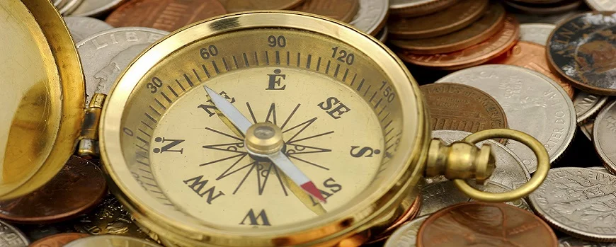 compass and coins