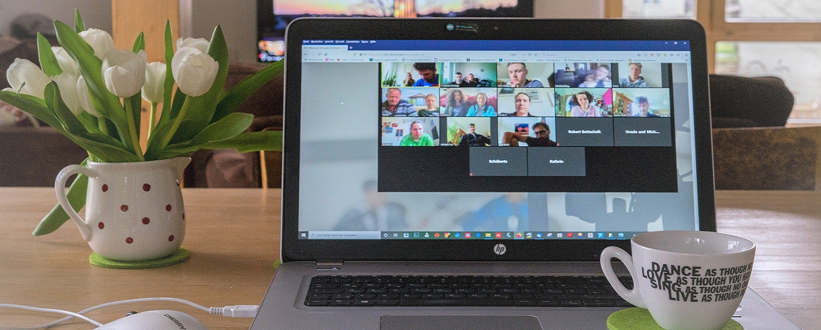 Laptop with online meeting on the screen - 