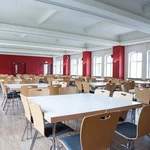 Auf dem Bild ist die Mensa auf dem Campus Am Neuen Palais zu sehen.