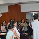 Participants listening to group presentation