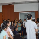 Participants listening to group presentation