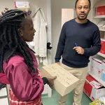 Gannouka discussing in the lab