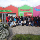 Group picture in front of the Farm 