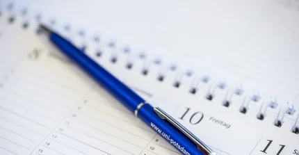 Kalender mit Stift