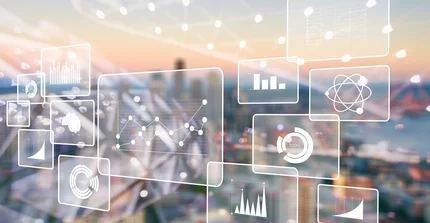 Beispielbild: technische Grafiken vor Hintergrund einer Stadt