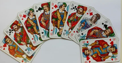Karten aus einem Rommè-Spiel: 6 Buben und eine Dame