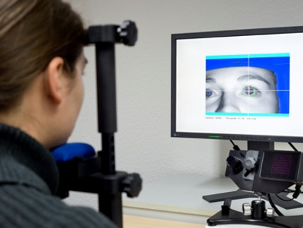 person in front of the Eyelink 100 system
