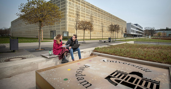 Two students at the university campus golm