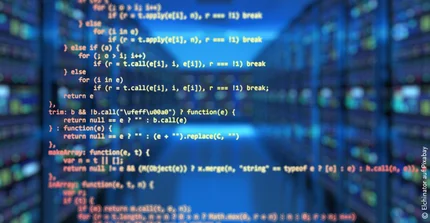 in the background: server room illuminated in blue, in the foreground: source code in yellow and red