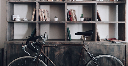 Bike in front of a shelf