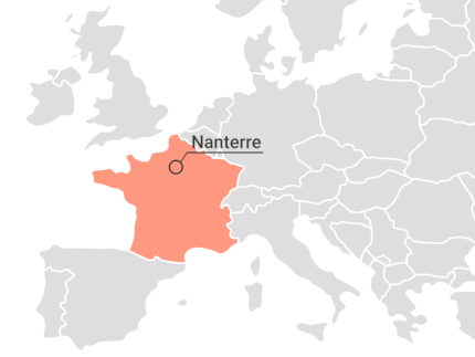 Detail of a map of Europe with the mark where the suburb Nanterre (Paris) is located.