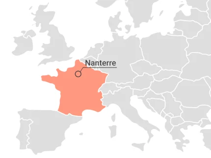 Detail of a map of Europe with the mark where the suburb Nanterre (Paris) is located.
