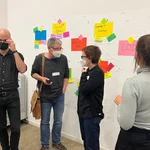 Participants talk to each other at the DH Jewish Hackathon 2022.